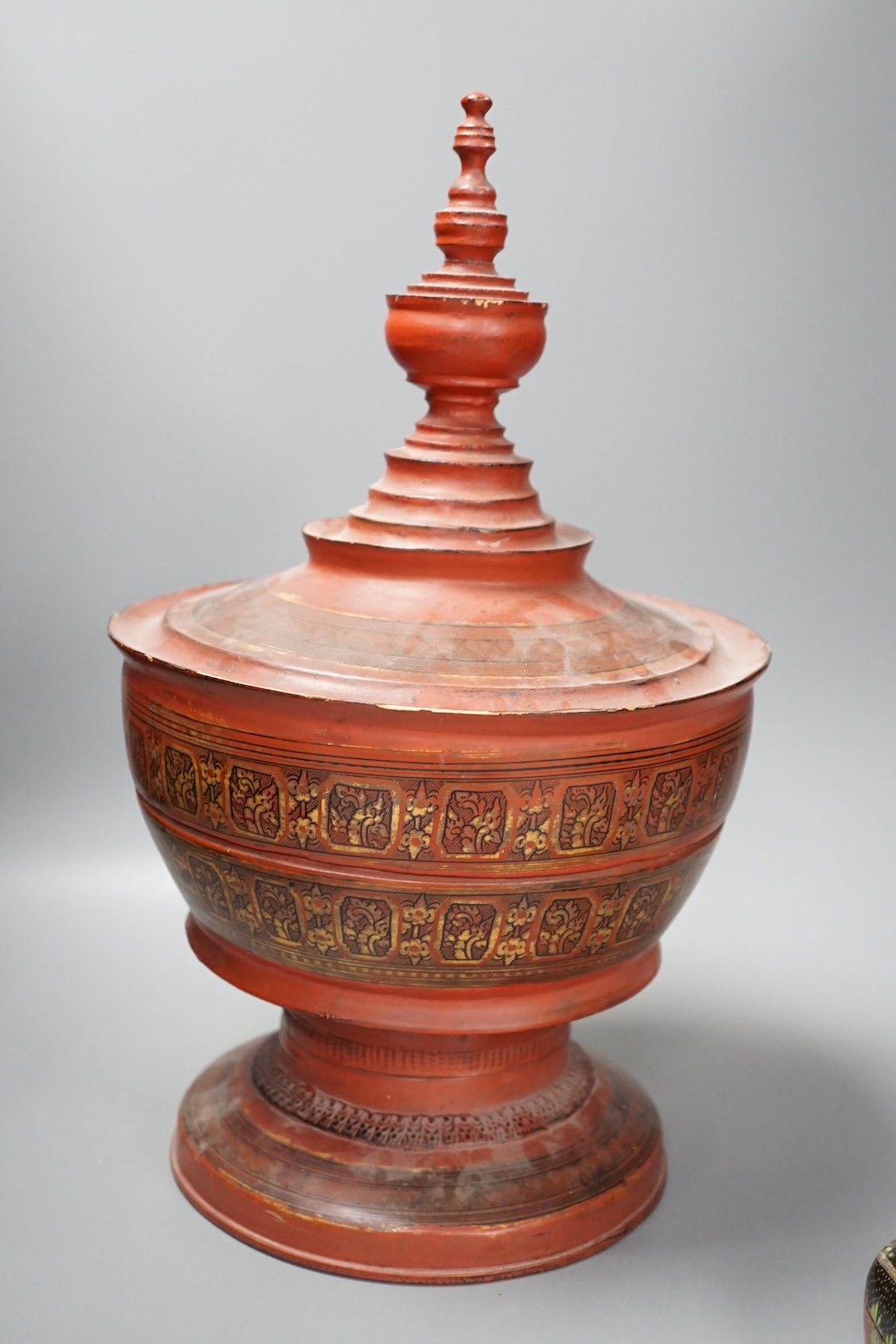 A Burmese lacquer box and cover, and a Persian lacquer box, tallest 41cm